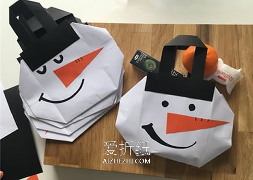 简单雪人纸袋的折法图解- www.aizhezhi.com
