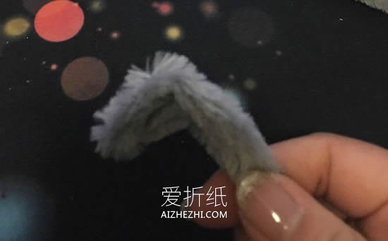 用扭扭棒做泰迪犬的方法- www.aizhezhi.com