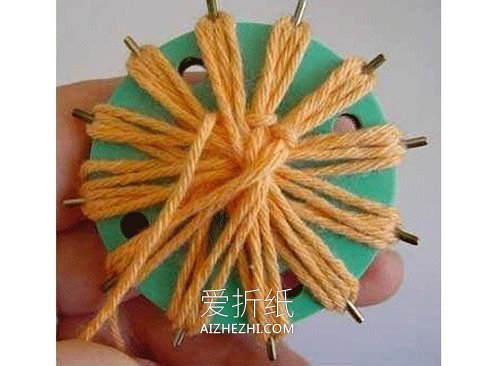 毛线花的制作方法图解- www.aizhezhi.com