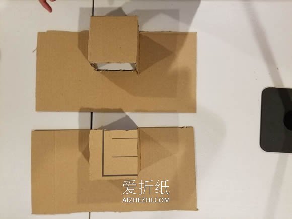 [视频]用硬纸板制作桌上足球桌的方法- www.aizhezhi.com