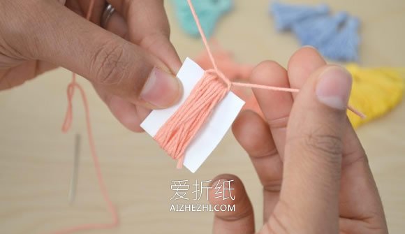 用纱线做流苏的方法- www.aizhezhi.com