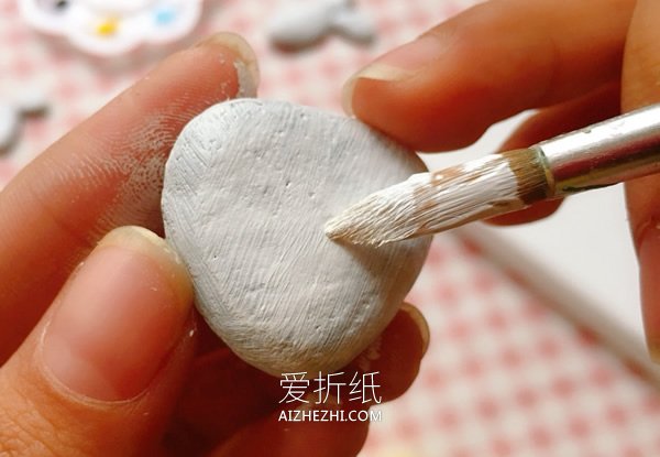 关于大海的石头拼贴画制作方法- www.aizhezhi.com