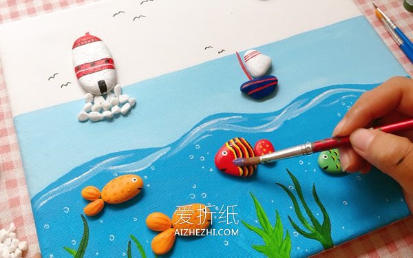 关于大海的石头拼贴画制作方法- www.aizhezhi.com