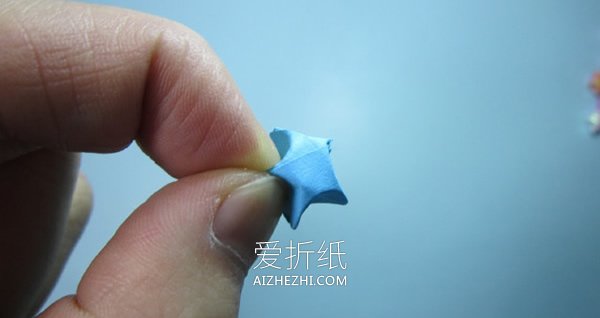 折纸幸运星的方法图解- www.aizhezhi.com