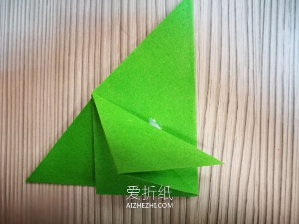 折纸圣诞节一品红花的图解教程- www.aizhezhi.com