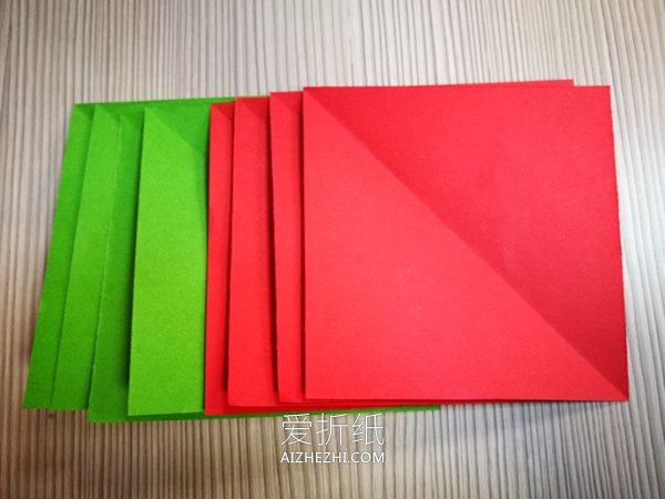 折纸圣诞节一品红花的图解教程- www.aizhezhi.com