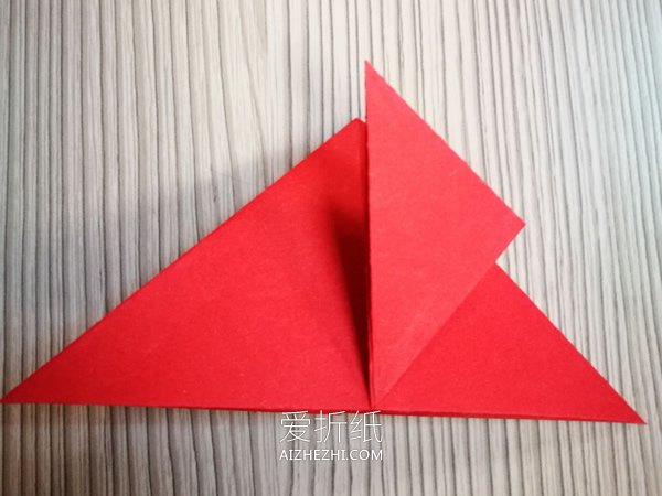 折纸圣诞节一品红花的图解教程- www.aizhezhi.com