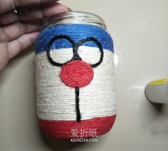 怎么用玻璃罐做哆啦A梦花瓶的方法教程- www.aizhezhi.com