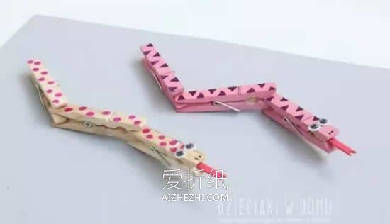 怎么用木衣夹做小蛇的方法图解- www.aizhezhi.com