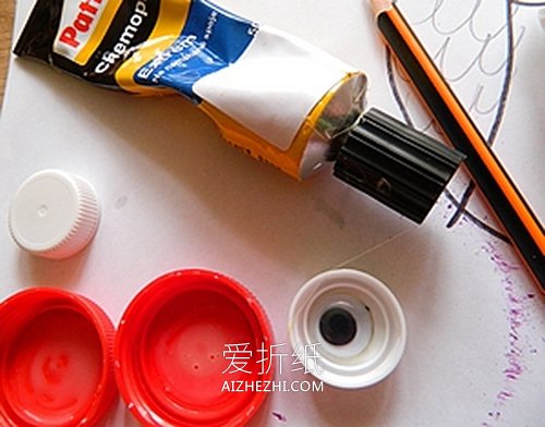 怎么用奶粉罐盖子做猫头鹰的方法图解- www.aizhezhi.com