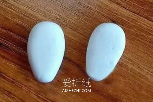 怎么用粘土做抱着胡萝卜的小白兔的方法图解- www.aizhezhi.com