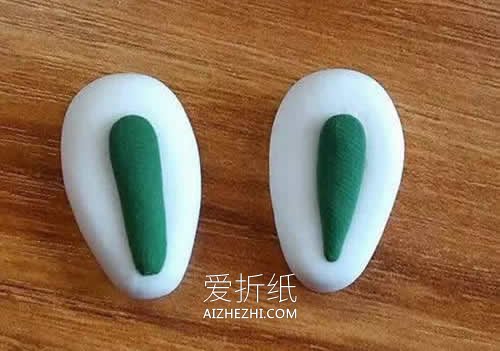 怎么用粘土做抱着胡萝卜的小白兔的方法图解- www.aizhezhi.com