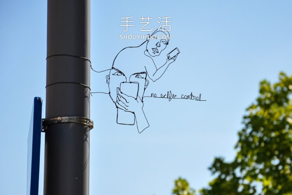 神奇铁丝艺术 DIY隐身路标路灯上的错位肖像- www.aizhezhi.com