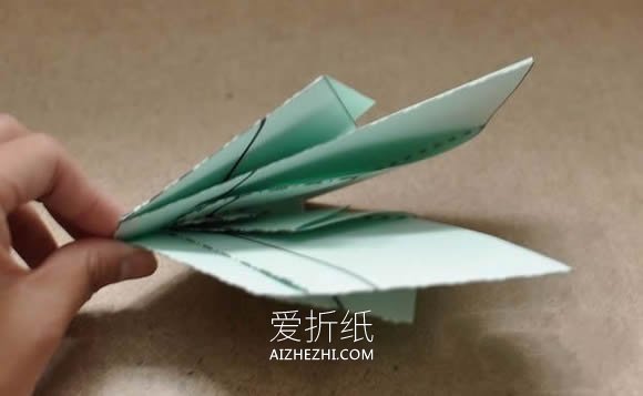 怎么一剪刀剪出天鹅的折叠方法图解- www.aizhezhi.com