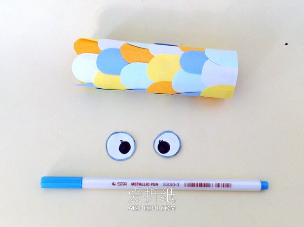 怎么用卷纸芯做日本鲤鱼旗的方法图解- www.aizhezhi.com