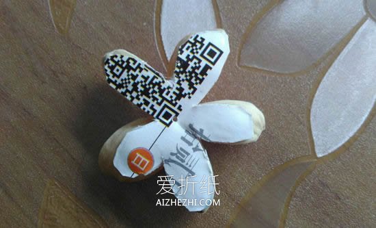 怎么用开心果壳做小花朵的方法图解- www.aizhezhi.com