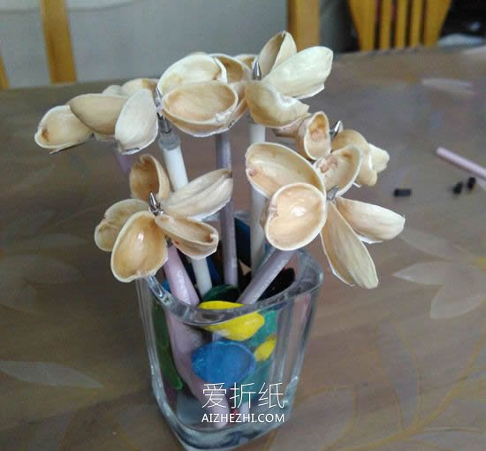 怎么用开心果壳做小花朵的方法图解- www.aizhezhi.com