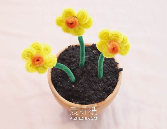 怎么做扭扭棒的花- www.aizhezhi.com