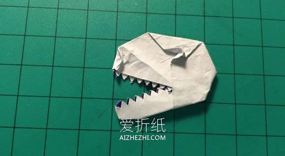 怎么用口香糖纸折纸恐龙头骨- www.aizhezhi.com