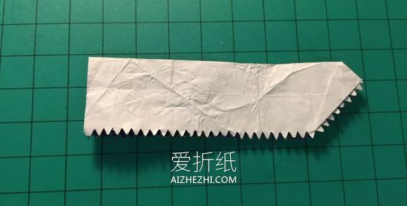 怎么用口香糖纸折纸恐龙头骨- www.aizhezhi.com