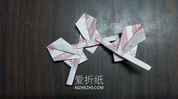 怎么用纸币折纸五瓣莲/五角星的方法图解- www.aizhezhi.com