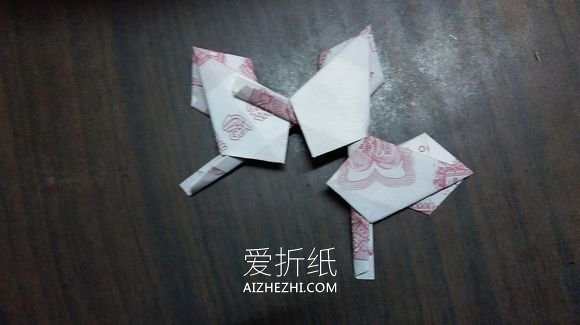 怎么用纸币折纸五瓣莲/五角星的方法图解- www.aizhezhi.com