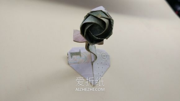 怎么折心花怒放用纸币- www.aizhezhi.com