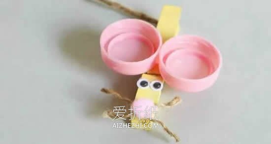 怎么用瓶盖和木夹子做老鼠- www.aizhezhi.com